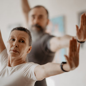 Photo of older couple practicing Tai Chi
